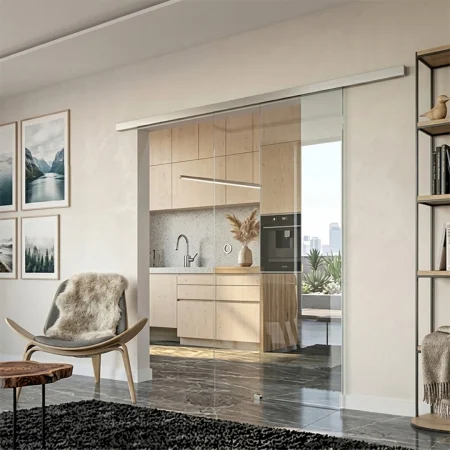 Corredera Hegox Tois 60 instalada a techo en puerta de vidrio
